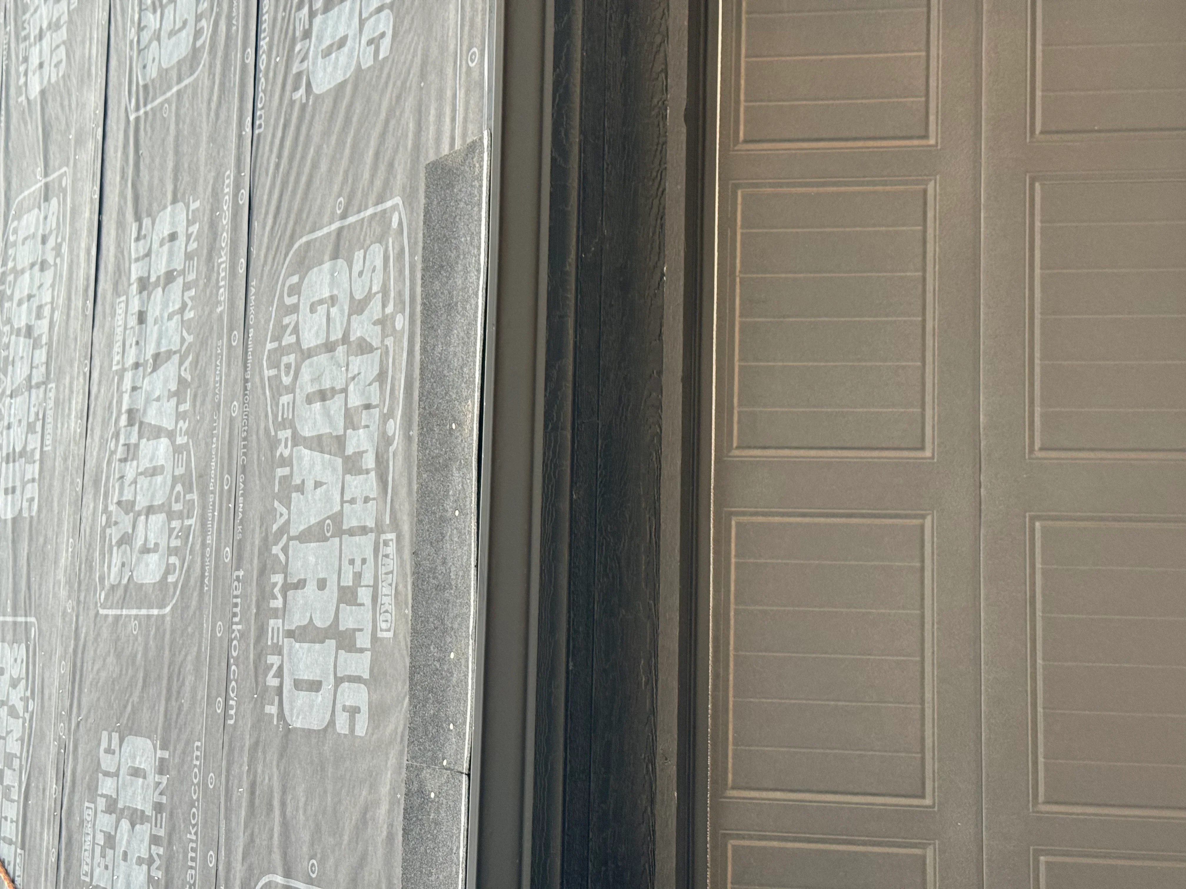 Synthetic roof underlayment with sealed seams and fasteners during installation